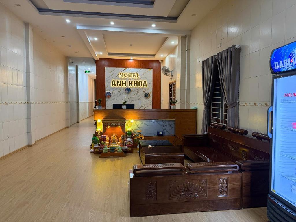 a lobby of an animal hospital with a fireplace at Motel Anh Khoa in Tam Kỳ