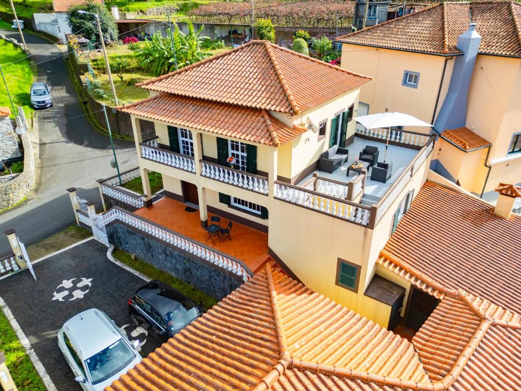 an aerial view of a house with orange tile roofs at View to the Valley, By OP in Senhora do Rosário