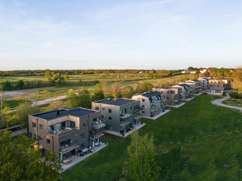 an aerial view of a row of apartment complexes at The Oak - Ekerum Öland in Borgholm