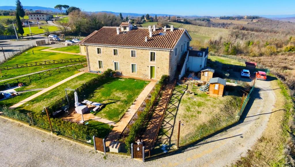 an aerial view of a large house with a yard at Sangi Chianti Vacations in Poggibonsi