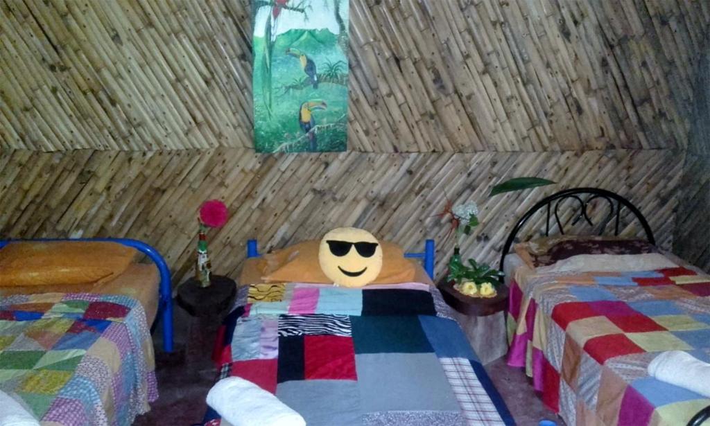 Postel nebo postele na pokoji v ubytování Hostal Familiar El Ángel Panamá B&B