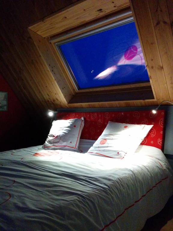 Postel nebo postele na pokoji v ubytování Cosmeur B&B
