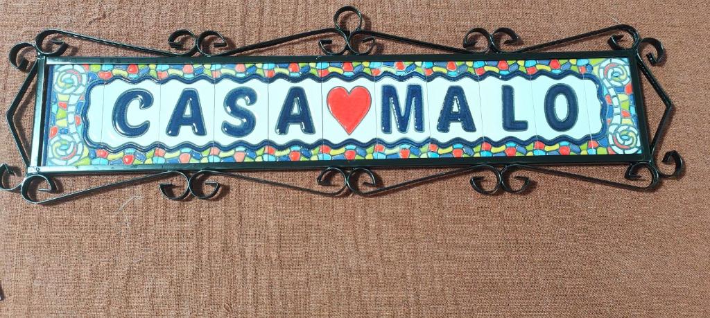 a sign that says casablanca hanging on a wall at Casa Malò 2 in Ovile la Marinella