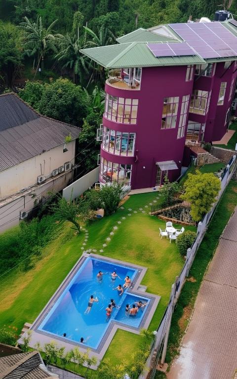 an overhead view of a house with a swimming pool at Kandy krush Hotel in Kandy