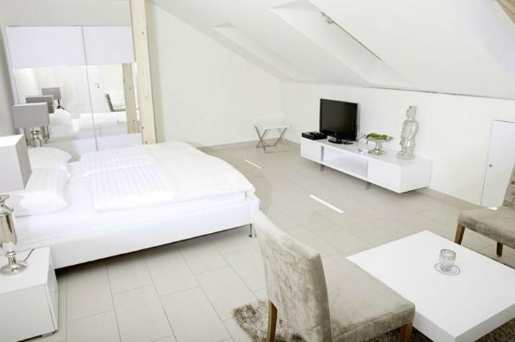 Letto o letti in una camera di Fischerhaus
