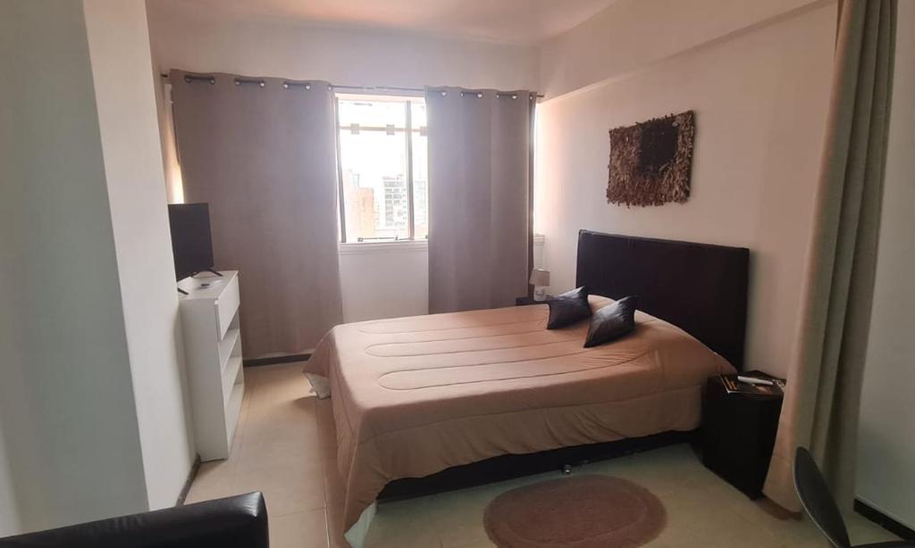 Llit o llits en una habitació de Monoambiente céntrico 01