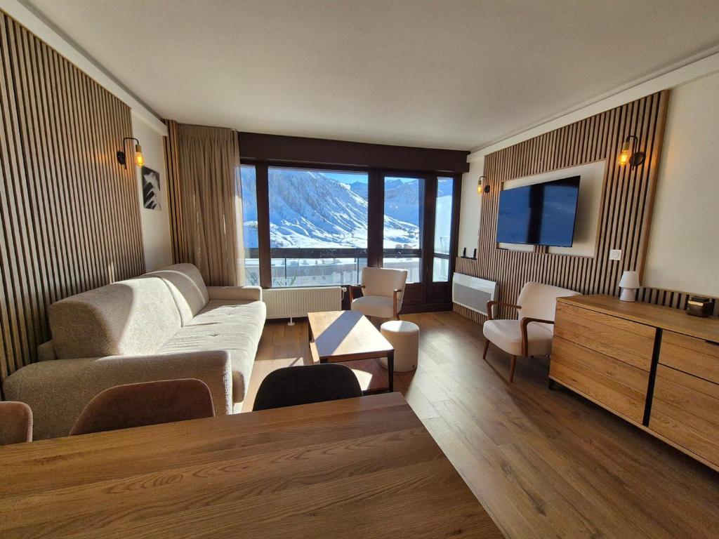 Appartement skis aux pieds avec balcon et cuisine équipée