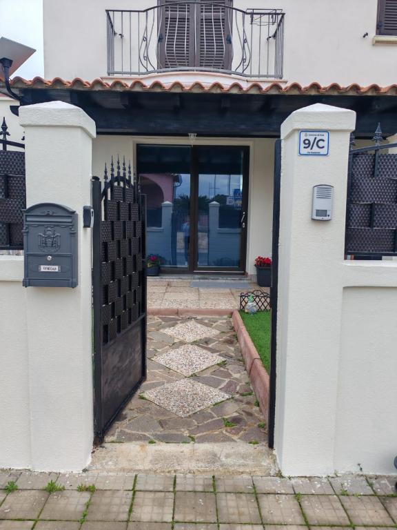 an entrance to a house with a black door at Villa Ohana in Pula