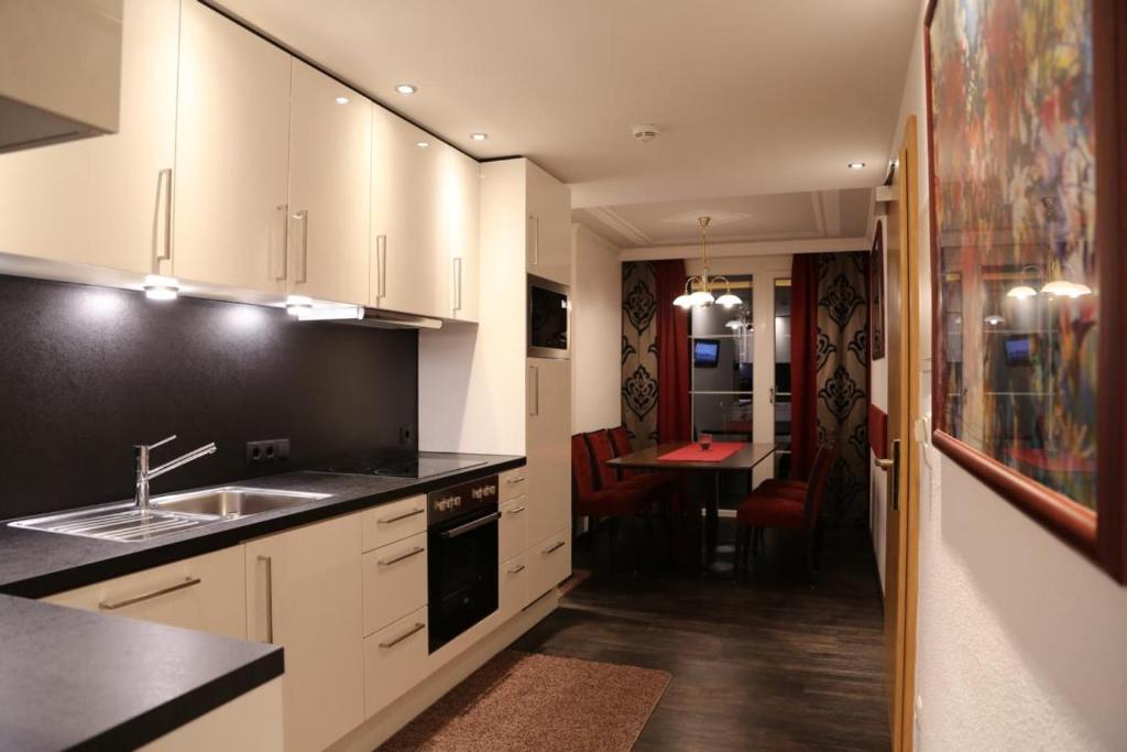 Kuchyň nebo kuchyňský kout v ubytování Hotel Vogt