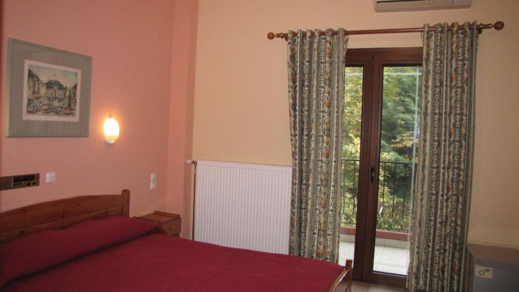 Postel nebo postele na pokoji v ubytování Spanias Hotel