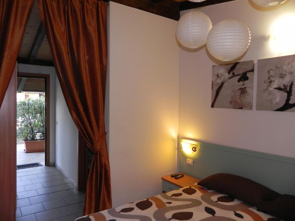 Postel nebo postele na pokoji v ubytování Hotel Universo