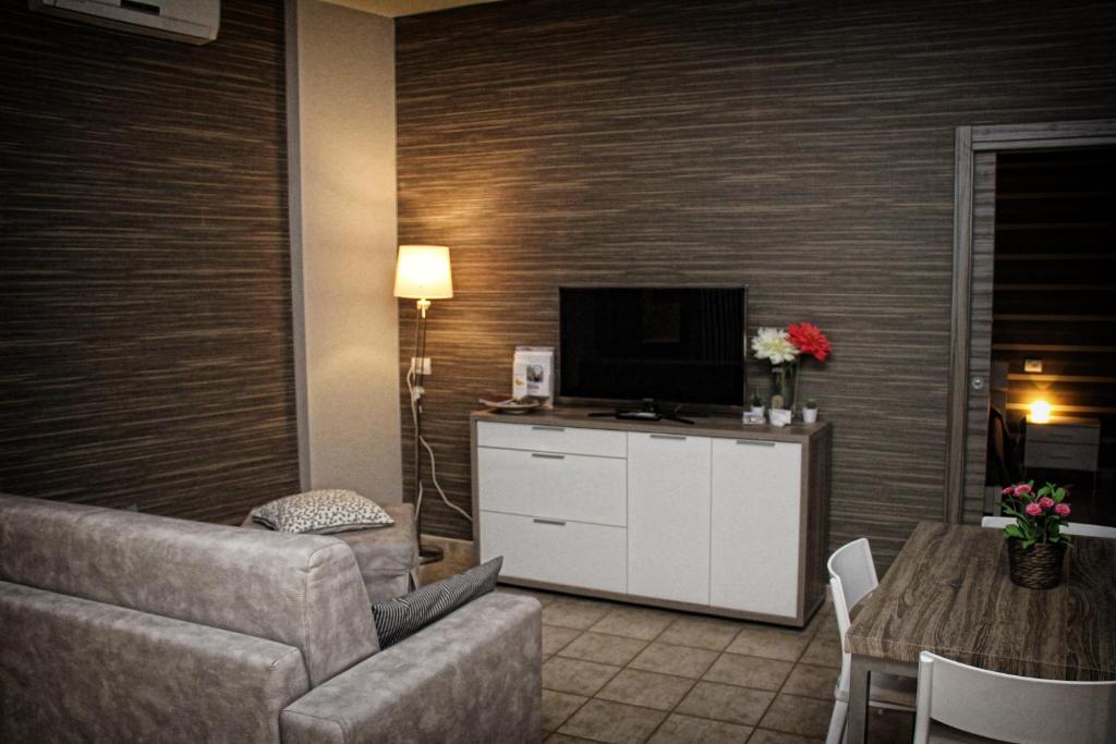 TV a/nebo společenská místnost v ubytování B&B ViaBrin 32