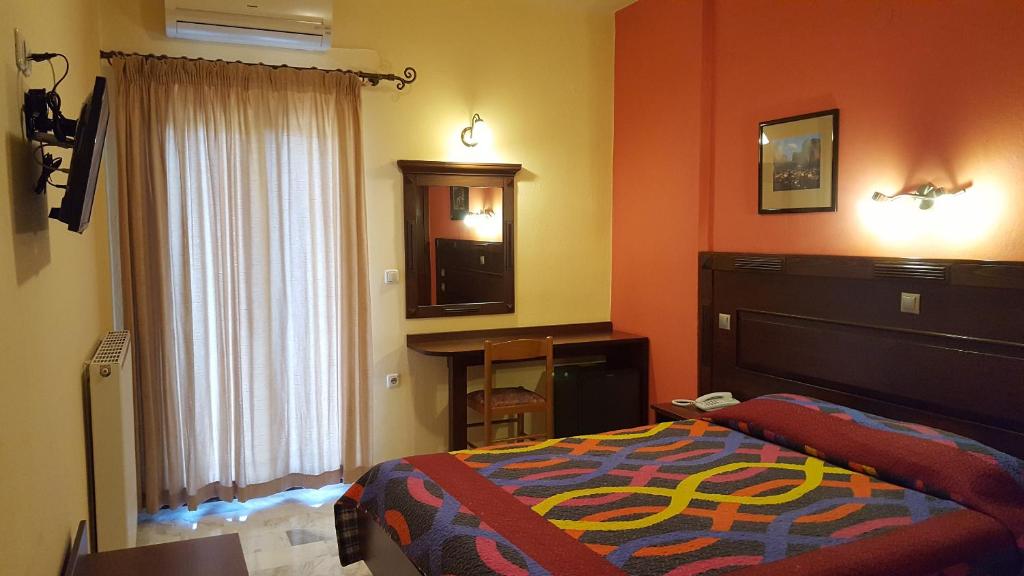Postel nebo postele na pokoji v ubytování Spanias Hotel