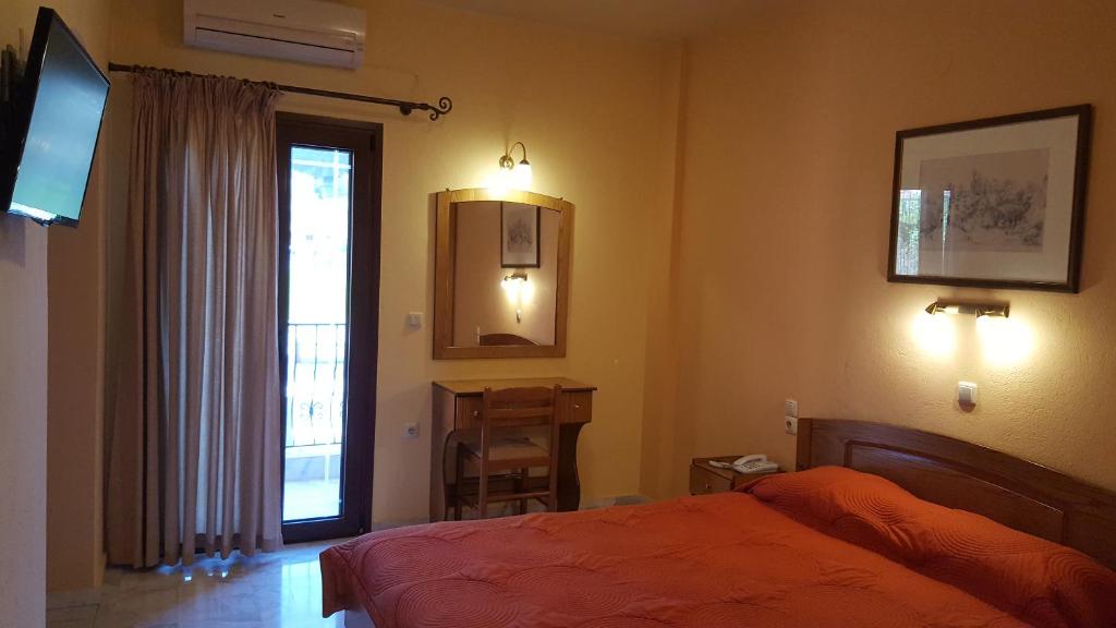 Postel nebo postele na pokoji v ubytování Spanias Hotel