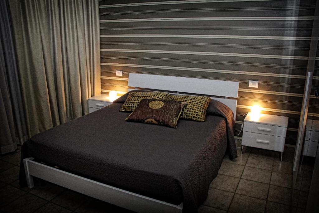 Ένα ή περισσότερα κρεβάτια σε δωμάτιο στο B&B ViaBrin 32
