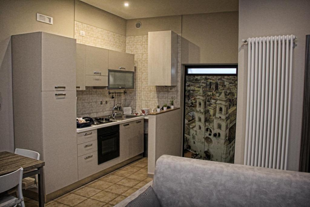 Kuchyň nebo kuchyňský kout v ubytování B&B ViaBrin 32