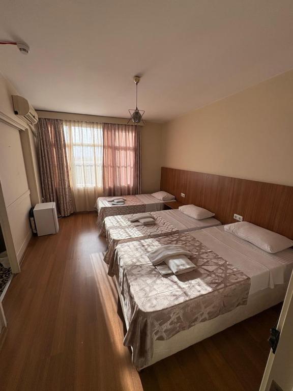 Adana Koza Hotel - Quarto Triplo Deluxe