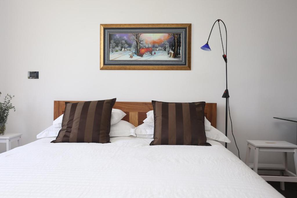 Łóżko lub łóżka w pokoju w obiekcie Apartment Larin