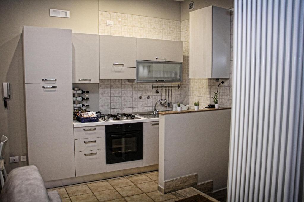 Kuchyň nebo kuchyňský kout v ubytování B&B ViaBrin 32