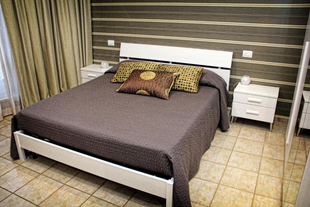 Postel nebo postele na pokoji v ubytování B&B ViaBrin 32