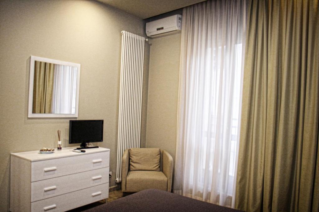 TV a/nebo společenská místnost v ubytování B&B ViaBrin 32