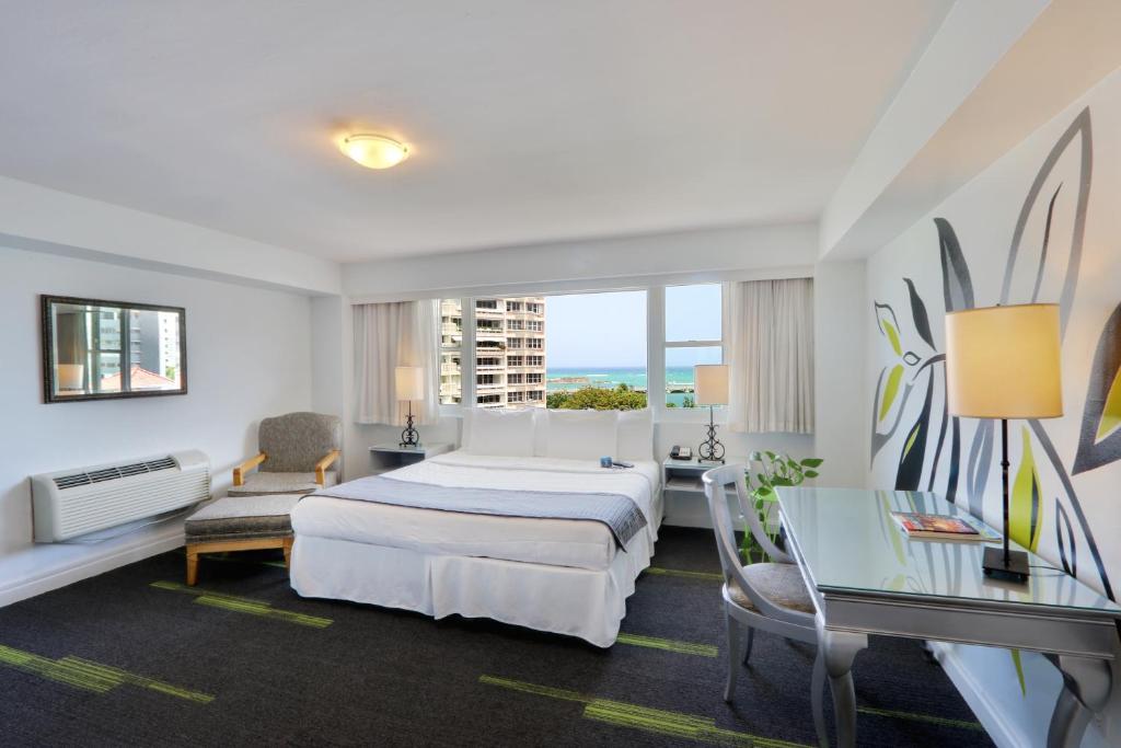 Postel nebo postele na pokoji v ubytování Hotel Miramar