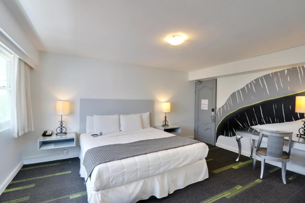 Postel nebo postele na pokoji v ubytování Hotel Miramar