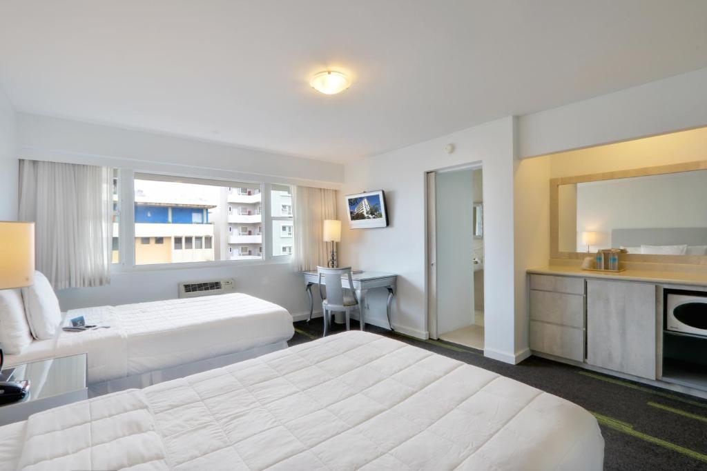 Postel nebo postele na pokoji v ubytování Hotel Miramar