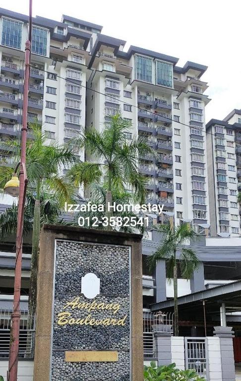 a sign in front of a large building at Izzafea Ampang KL in Ampang