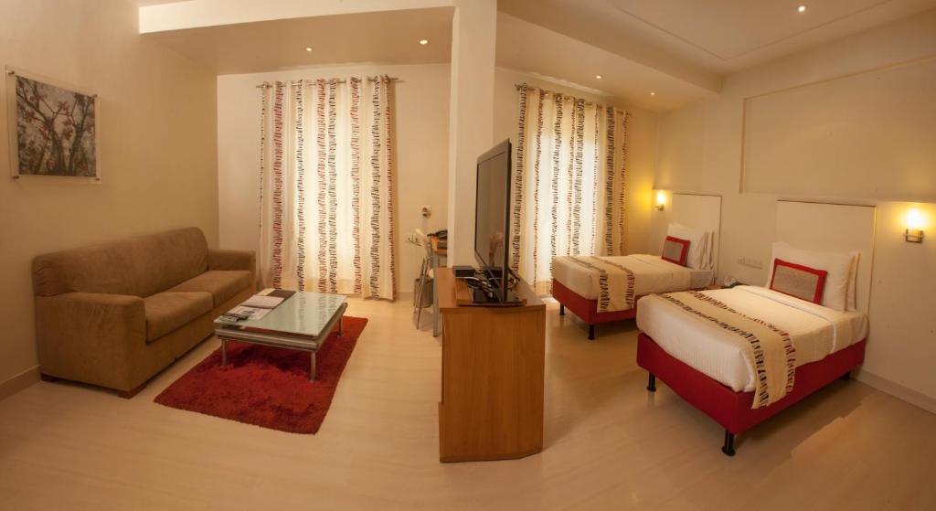 TV a/nebo společenská místnost v ubytování Avalon Courtyard Residence Suites