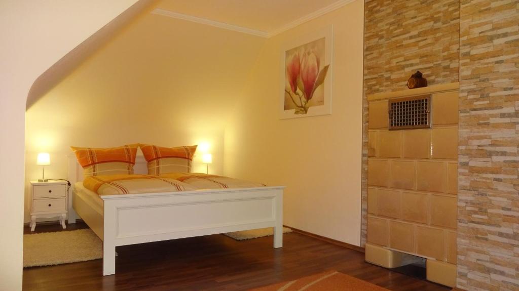 Een bed of bedden in een kamer bij Holiday Apartment