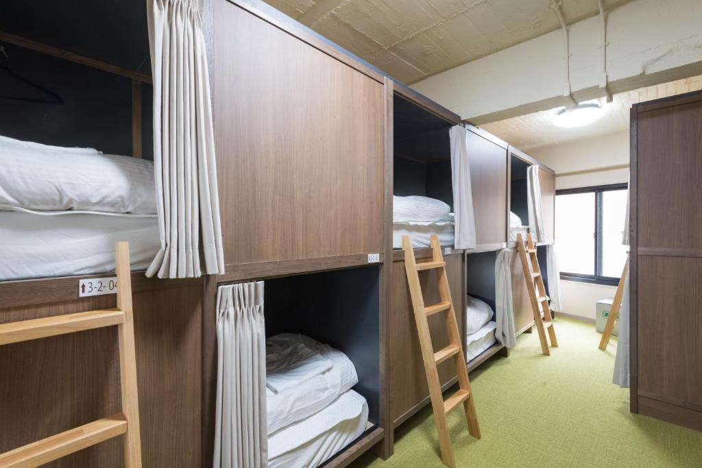 Postel nebo postele na pokoji v ubytování Tokyo Guest House Itabashi-juku