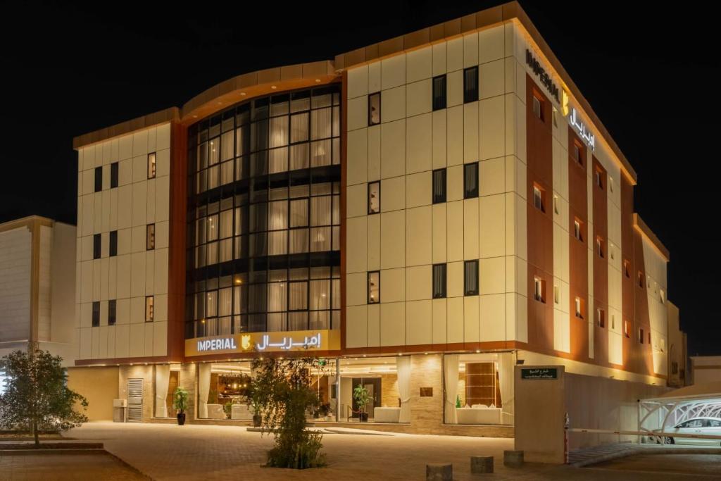 a large building at night at Imperial - إمبريال in Riyadh