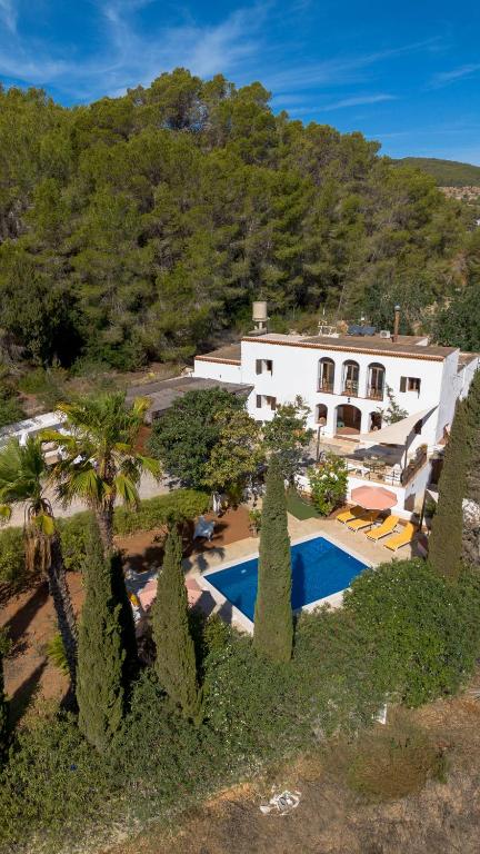 an aerial view of a house with a swimming pool and trees at Finca Can Rosa Ibiza, private pool, a nature getaway in Santa Gertrudis de Fruitera