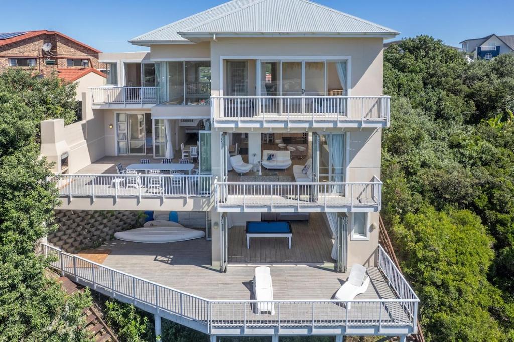an aerial view of a large house with a deck at 53 Island Road in Seafield