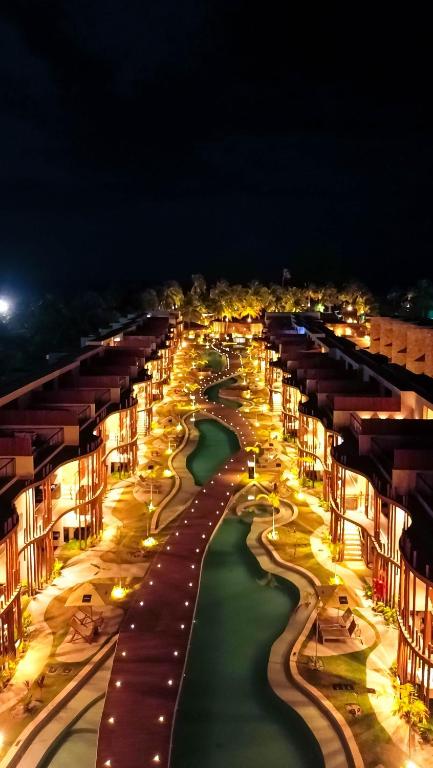 an aerial view of a city at night at Studio River 101 in Pôrto de Pedras