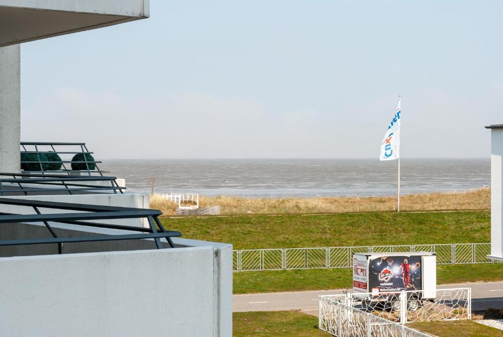 a view of the ocean from the roof of a building at Hanseatic 210 in Duhnen