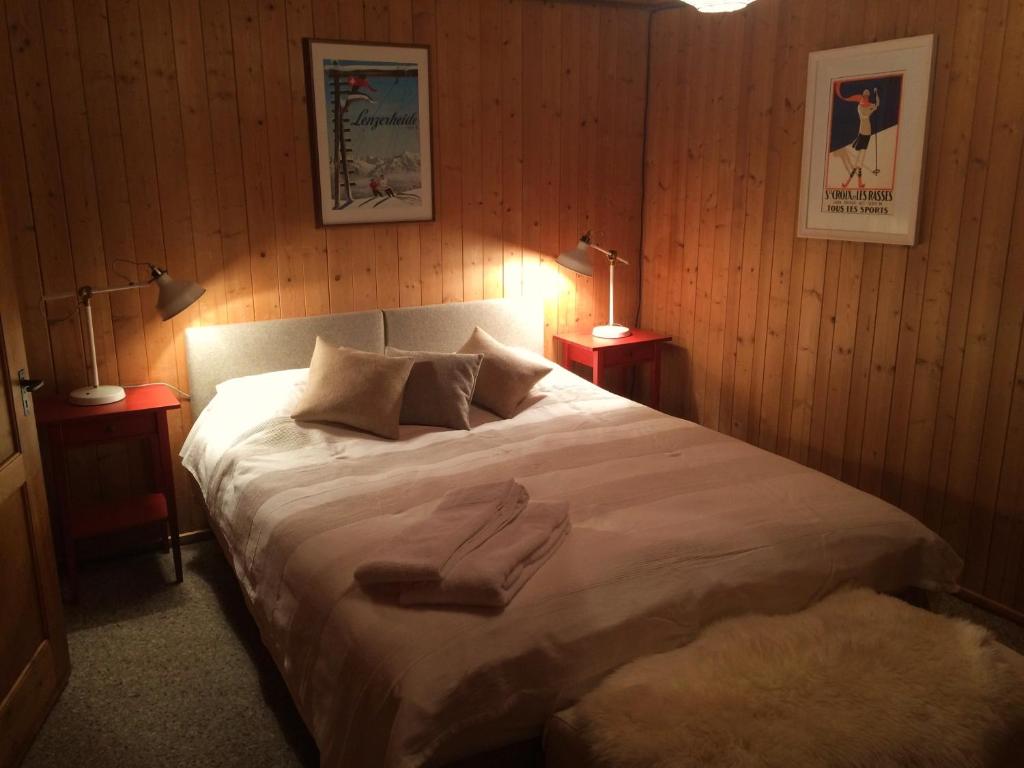 Postel nebo postele na pokoji v ubytování Chalet Nidus Montis
