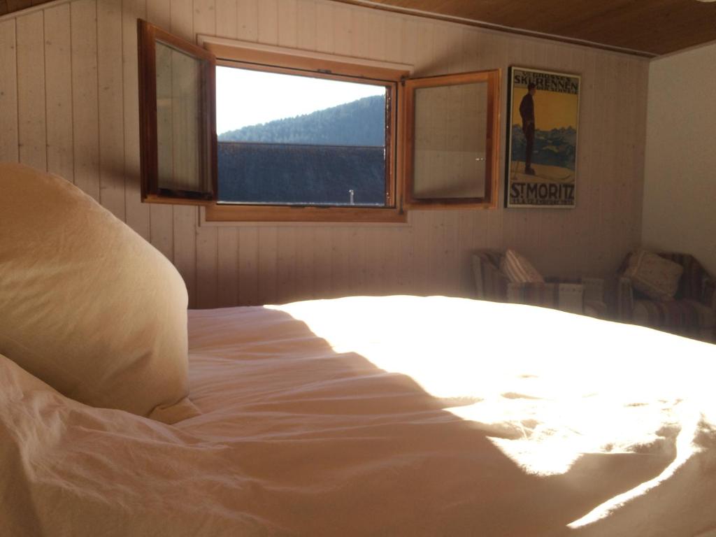 Postel nebo postele na pokoji v ubytování Chalet Nidus Montis