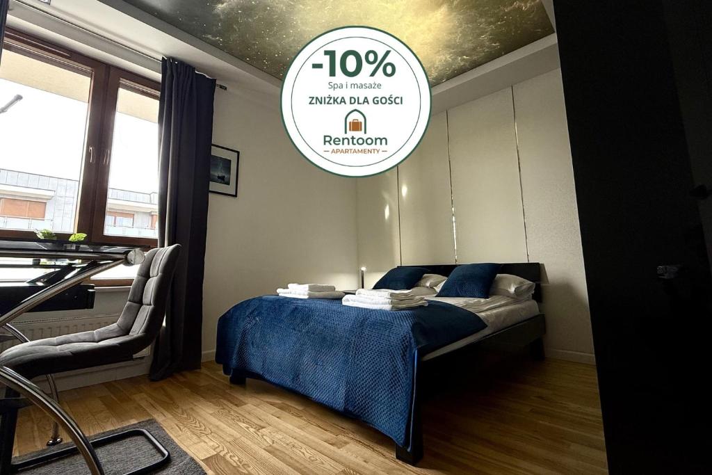 a bedroom with a bed and a sign that reads paracistel assisted at Jacuzzi & Parking Piernikowy Spa Apartment by Rentoom in Toruń