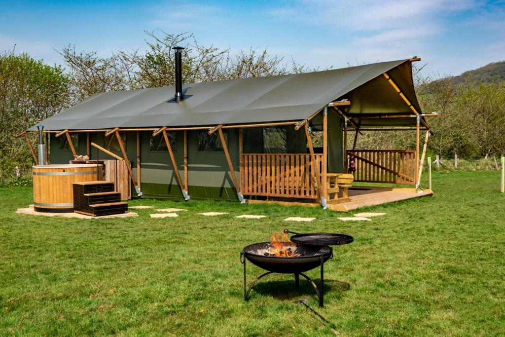a gazebo with a grill in front of it at 3 Bed in Talybont-on-Usk oc-wal376 in Talybont