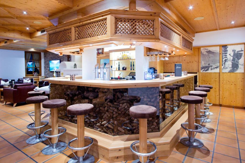 Lounge nebo bar v ubytování Hotel in the HEART of the Alps