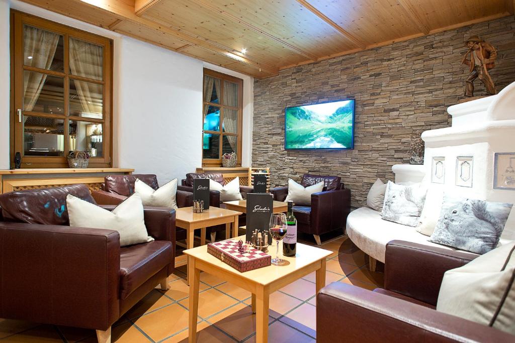 Posezení v ubytování Hotel in the HEART of the Alps