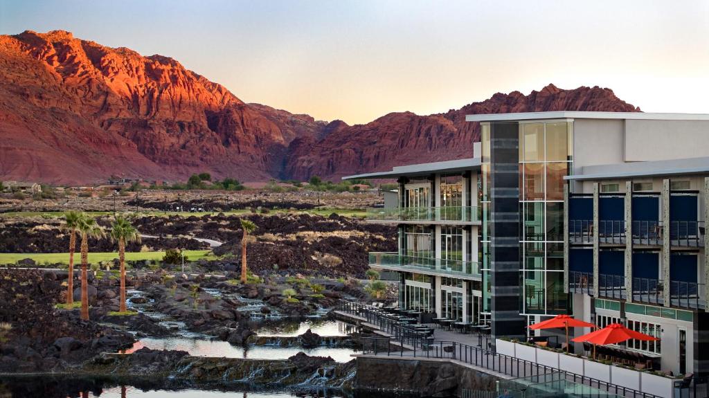 a rendering of a hotel with mountains in the background at Black Desert Resort in Ivins