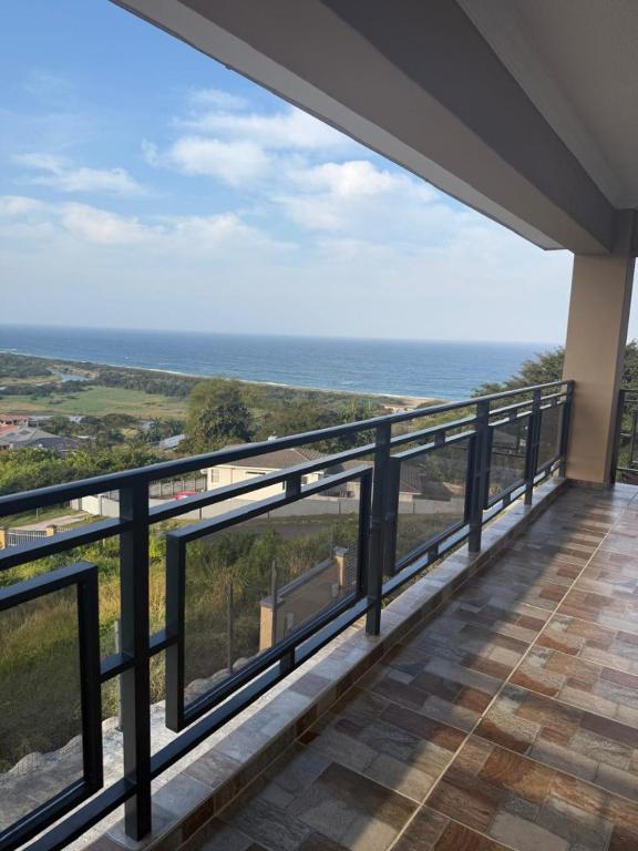 a balcony with a view of the ocean at Oceanview Oasis in Freeland Park
