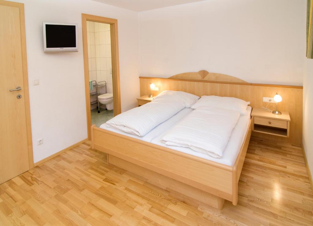 Postel nebo postele na pokoji v ubytování Appartement Kurz Top 1