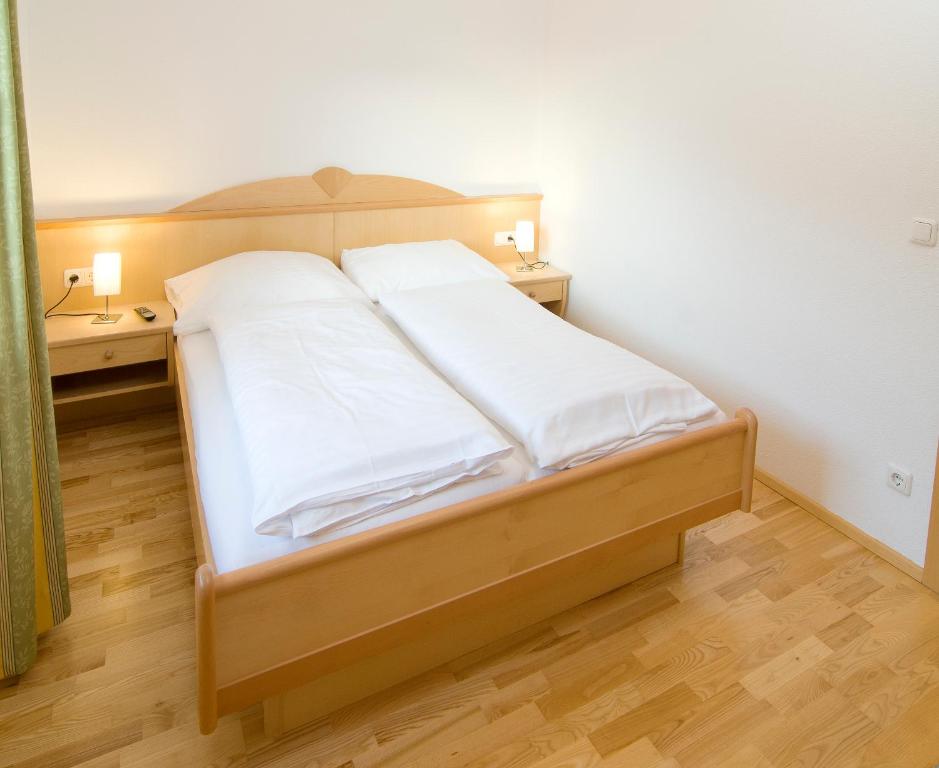 Postel nebo postele na pokoji v ubytování Appartement Kurz Top 1
