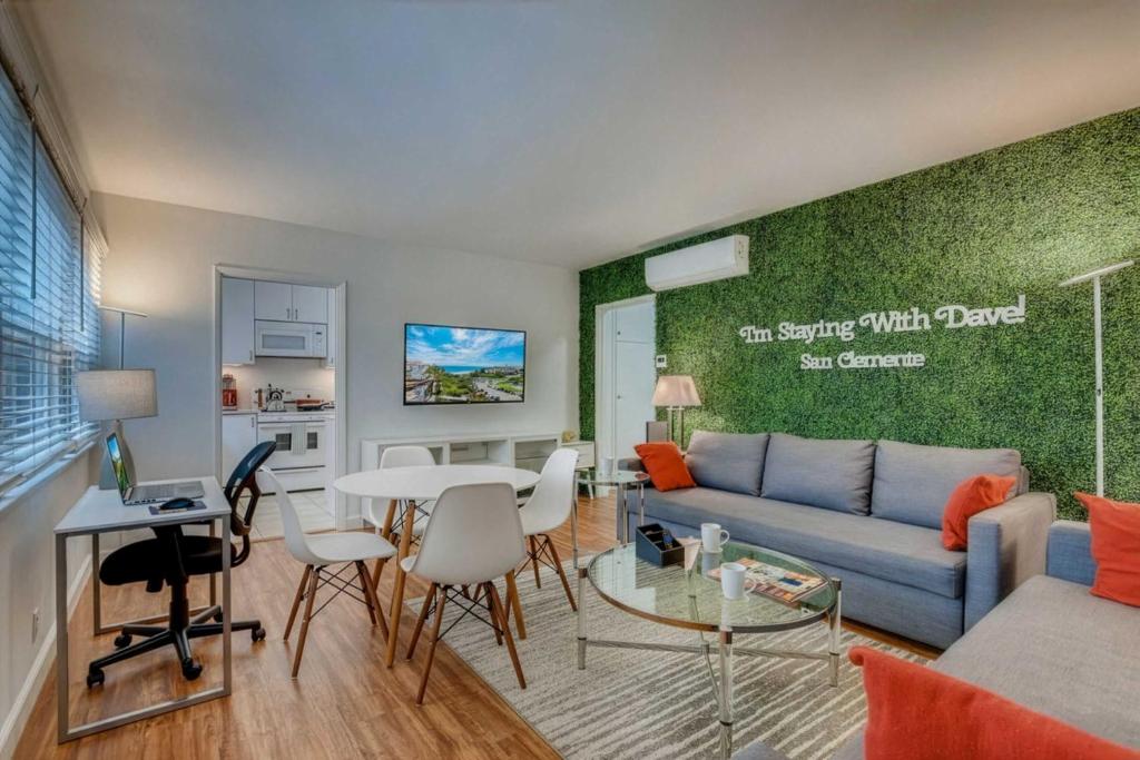 a living room with a couch and a table at Walk To Beach 2BR Top Location - AA in San Clemente