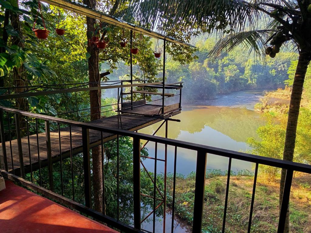 a view of a river from a suspension bridge at Riverview Adventure Resort in Kitulgala