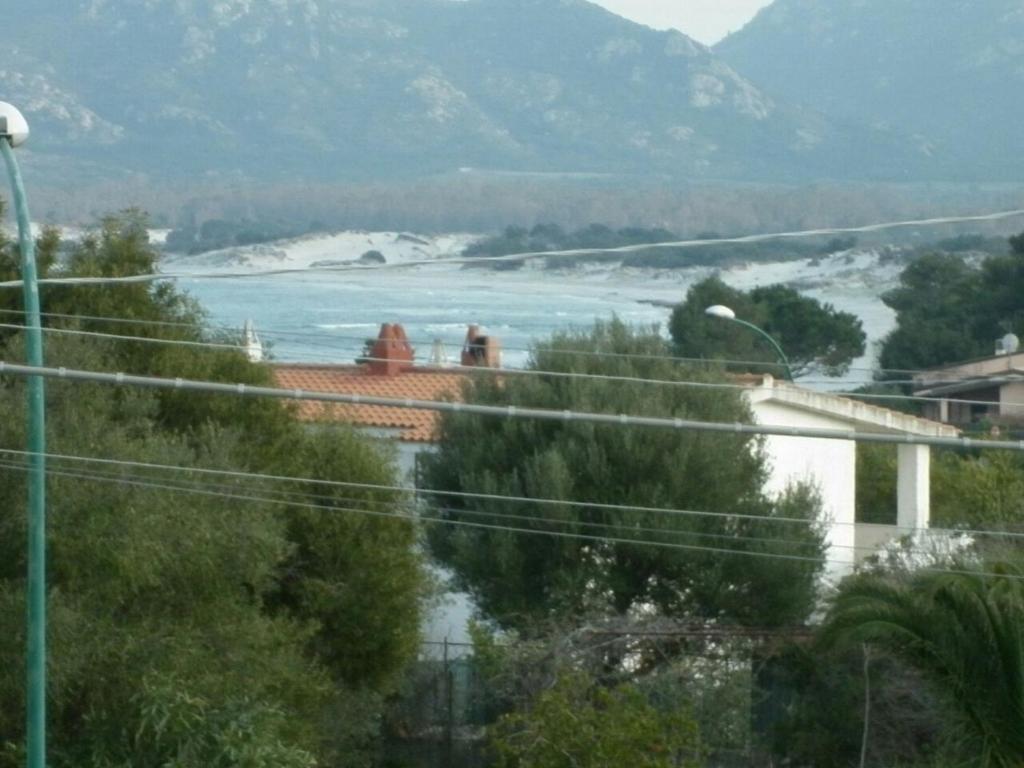 a view of a body of water with mountains at Casa Pipere in Santa Lucia